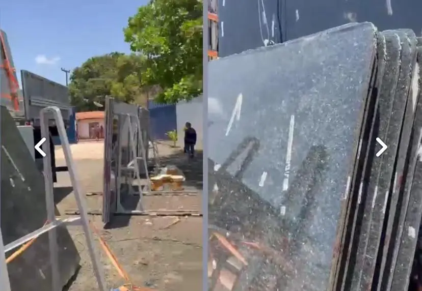dois homens são esmagados por uma placa de mármore