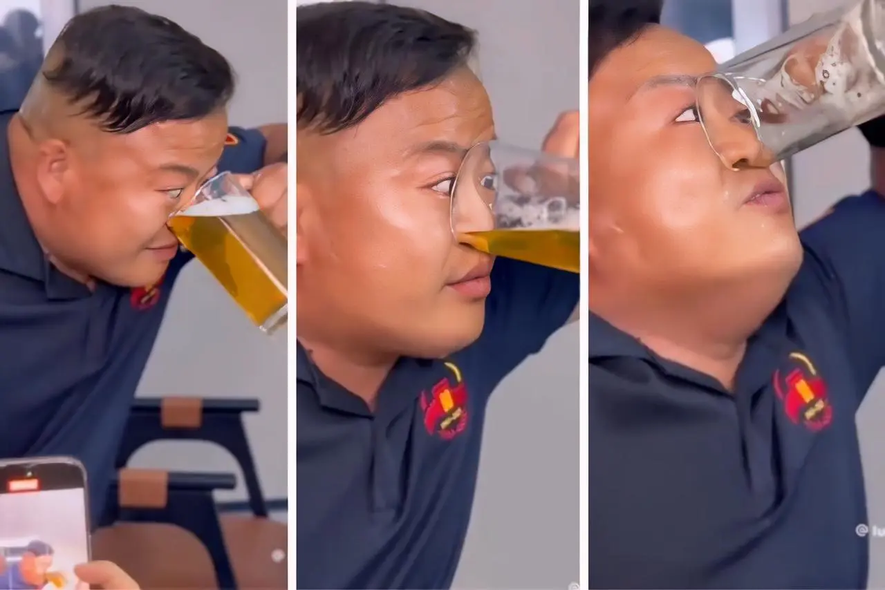 Homem bebe caneca de cerveja inteira pelo nariz  || Reprodução: Redes Sociais 