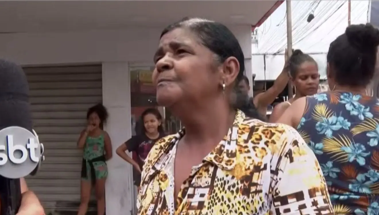 Tia de traficante morto em megaoperação desabafa: 'eu falava pra ele sair dessa vida' (Foto: Reprodução/SBT)
