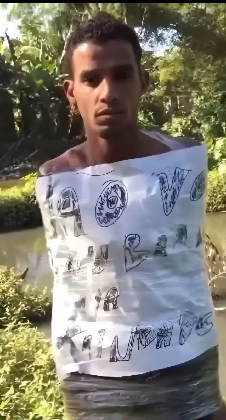 Vaza vídeo de desafeto jogado para jacarés em comunidade do Rio (Foto: Reprodução/Redes sociais)