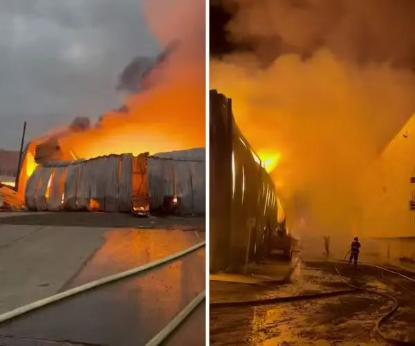 Galpão é tomado pelo fogo e equipes usando caminhões-pipa para conter o avanço das chamas. Foto: Divulgação / Corpo de Bombeiros.