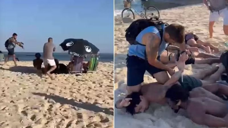 Suspeito foi detido na praia (Foto: Reprodução / Redes Sociais)