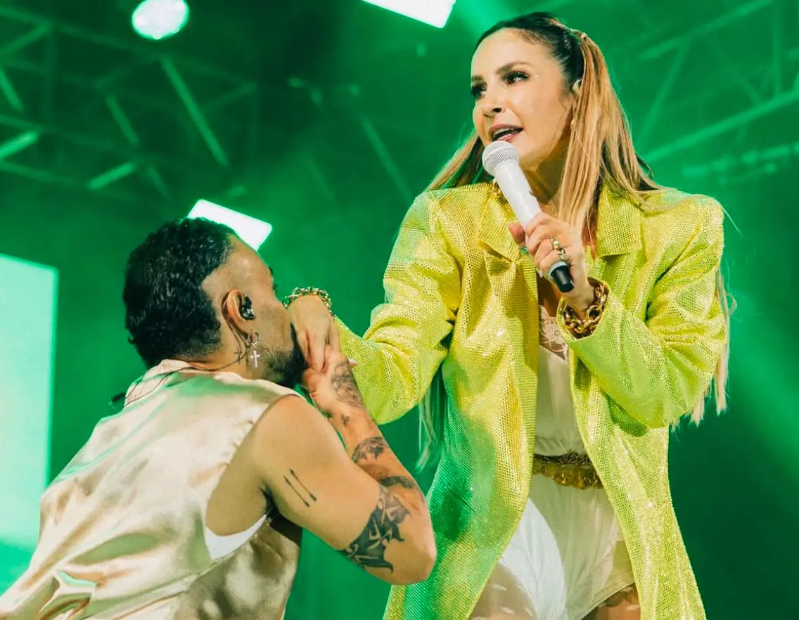 O bailarino Robson Mano e a cantora Claudia Leitte em show || Reprodução: Redes Sociais 