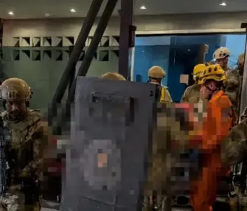 BOPE explode porta de apartamento e prende suspeita de matar jornalista após horas de tensão