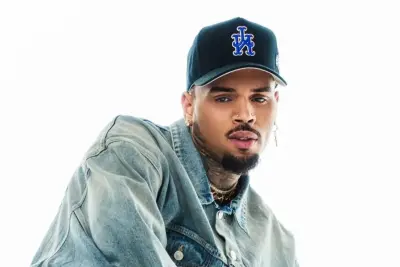 Chris Brown é condenado a indenizar ex-funcionária após ataque de cachorro